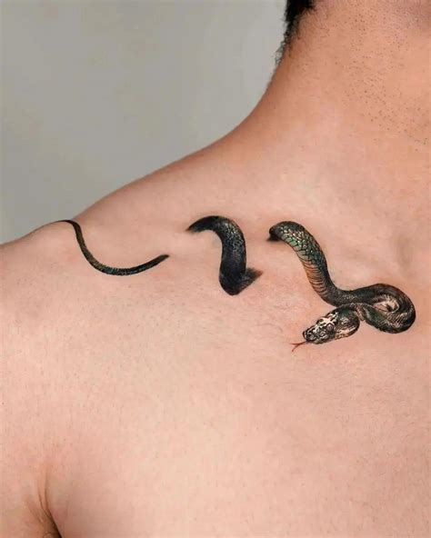 snake tattoo around shoulder